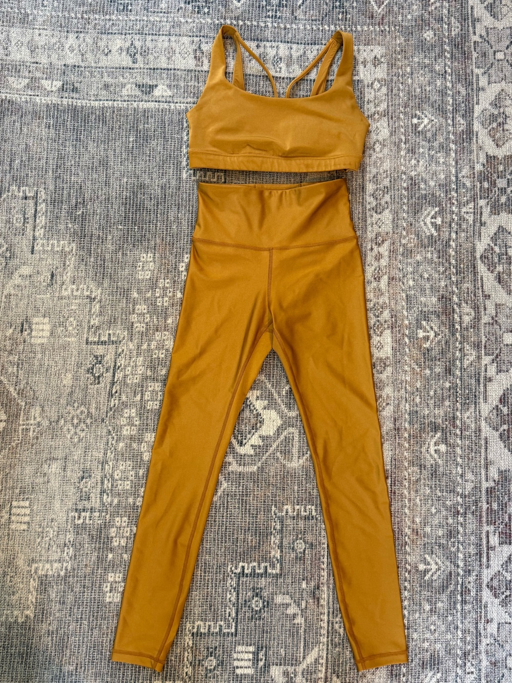 NWOT Athleta sorts bra and legging set. Unique shimmery gold color. Sz SM